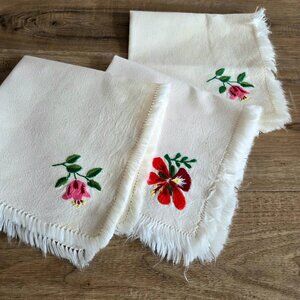 3 linen embroidered napkins with floral design. New.